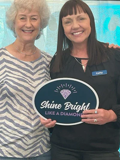 Dr. with happy dental savings plan patient at Pier 210 Dental Group